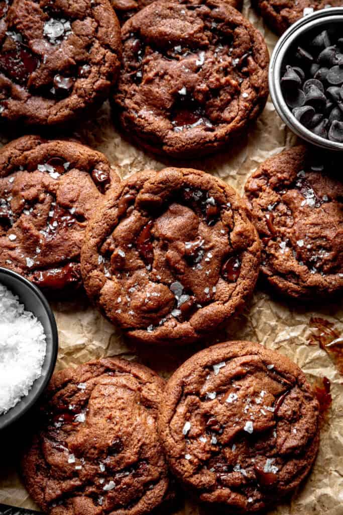 Double chocolate cookies, a cup of flaky salt and a cup of chocolate chips.