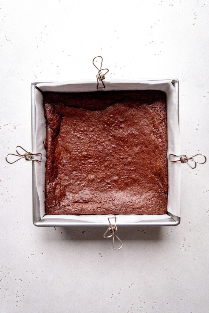Baked brownies in a square pan.