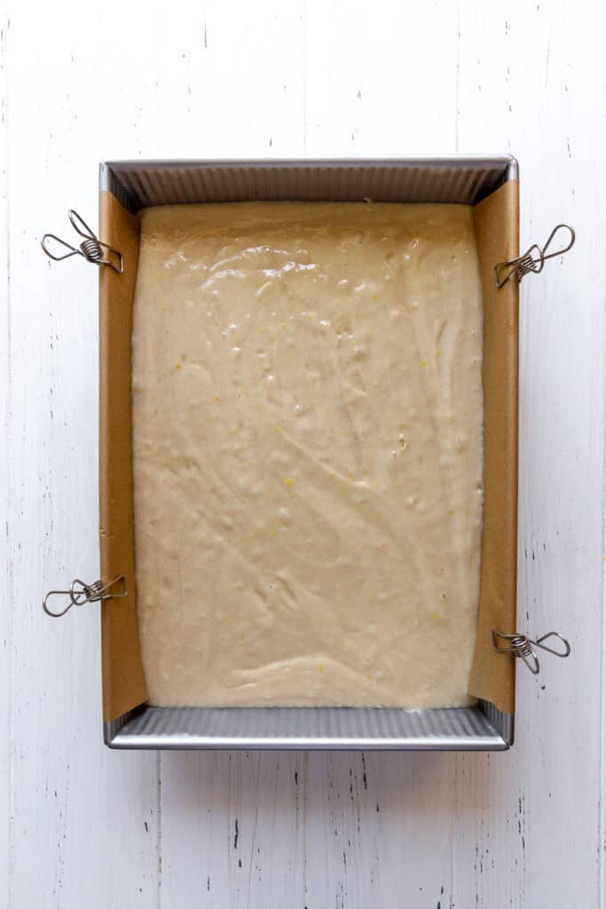 Unbaked cake in a rectangle pan.