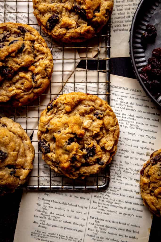 Oatmeal raisin cookies and loose books pages.
