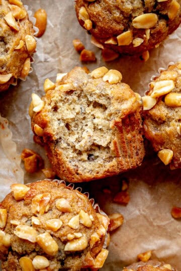Peanut butter banana muffins with a bite taken out of it.