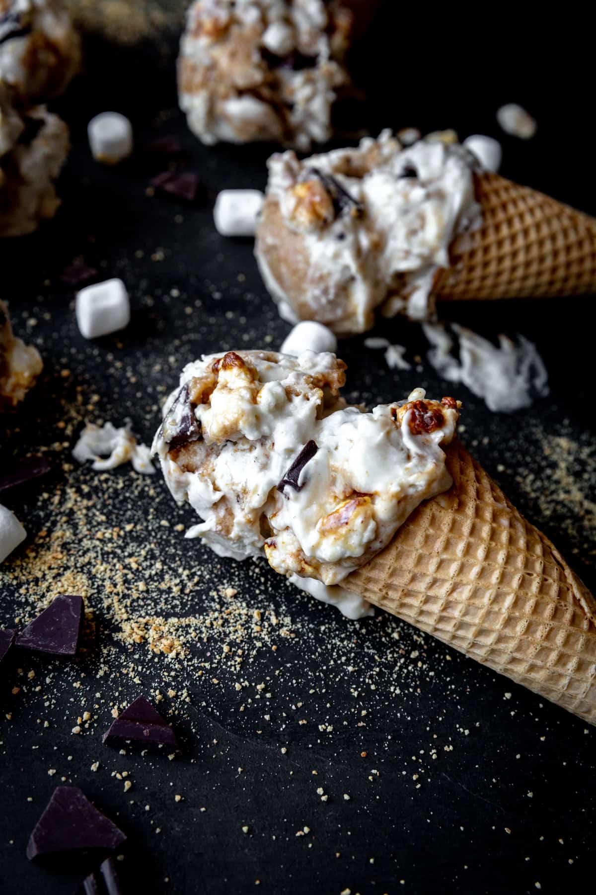 S'mores ice cream melting out of an ice cream cone.