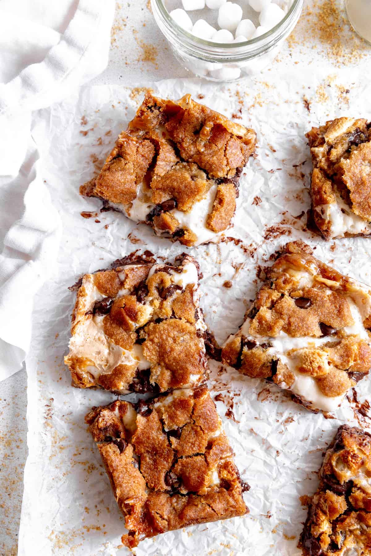 S'mores bars and a white linen napkin.