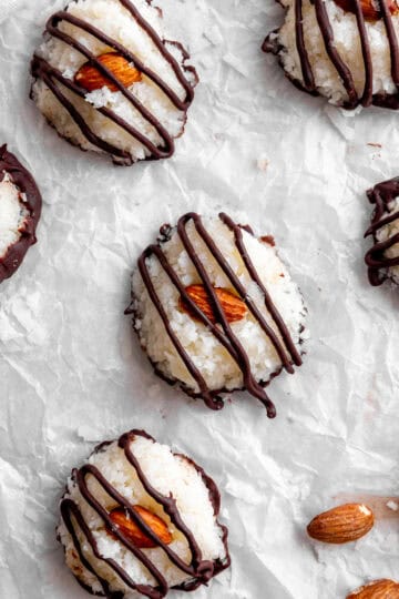 Almond joy bites on crumpled parchment paper.