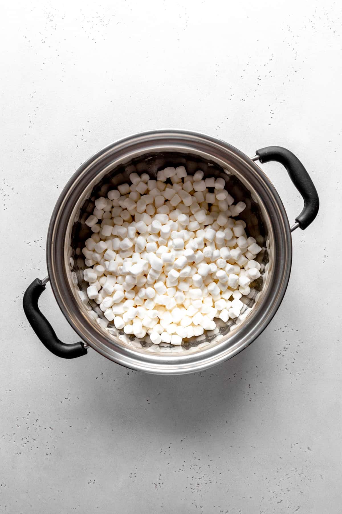 Mini marshmallows in a large pot.