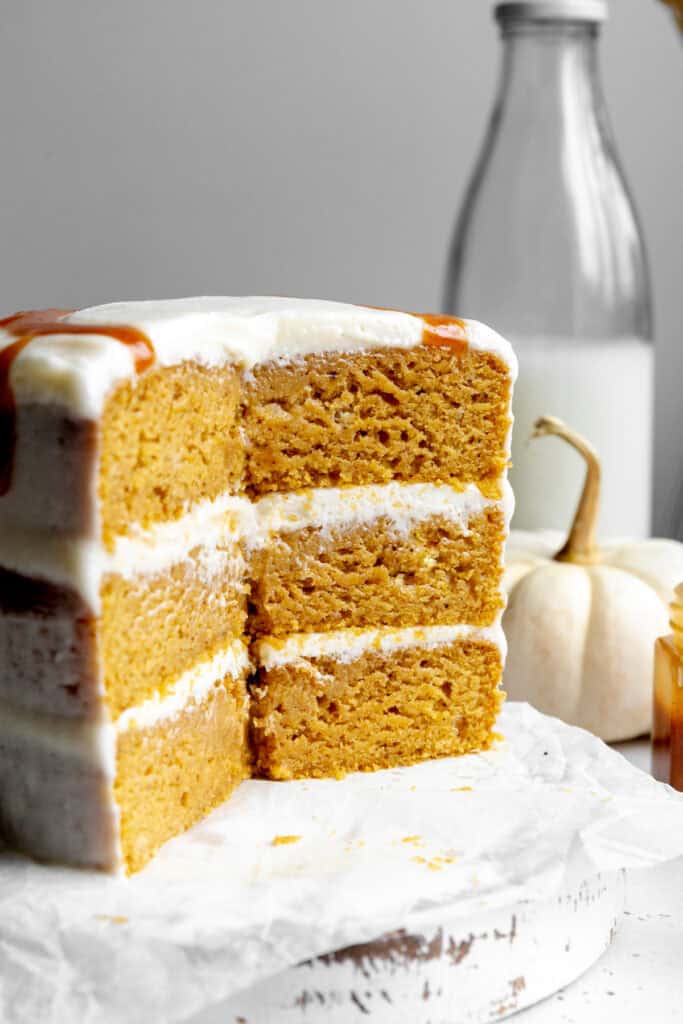 Pumpkin layer cake and a jug of milk.