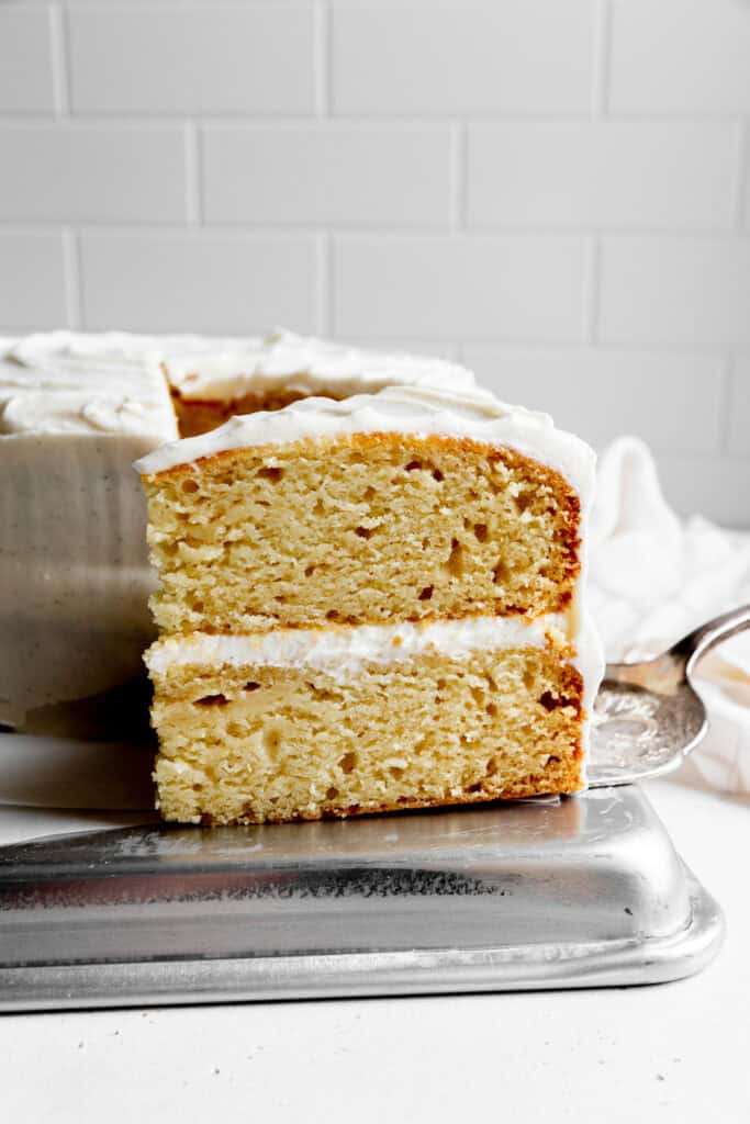 Slice of vanilla layer cake.