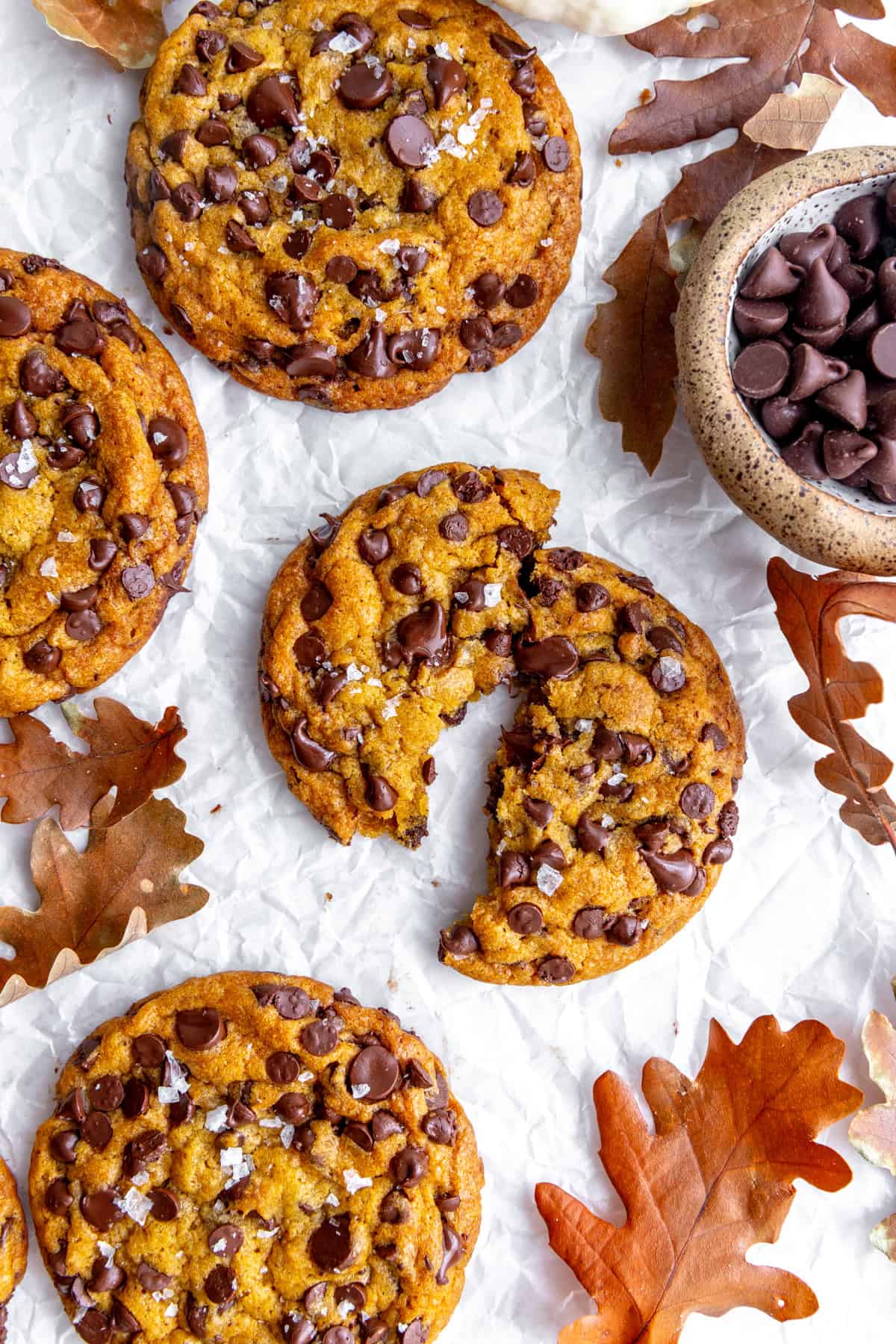 Pumpkin chocolate chip cookie that has been split in half.