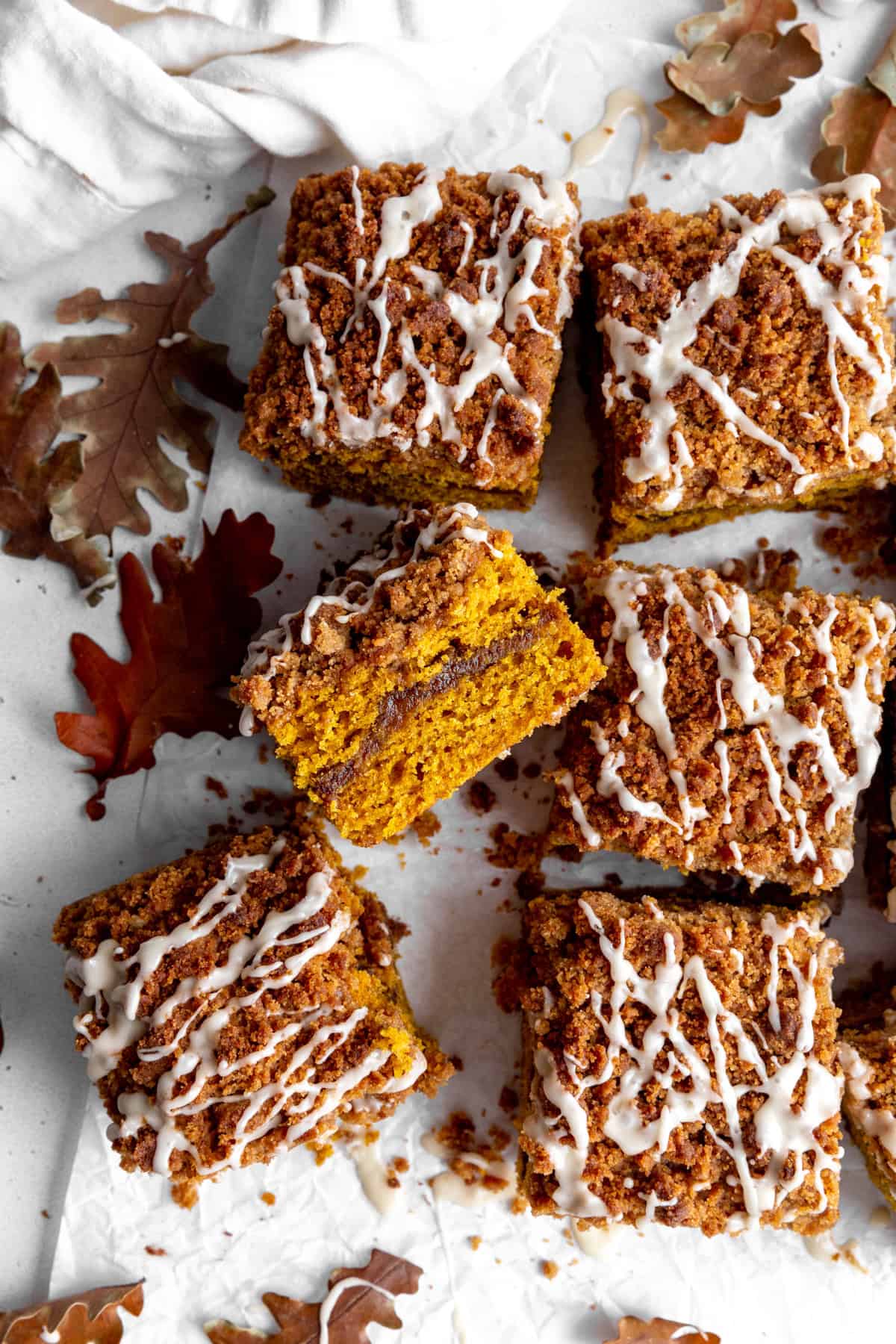 Slice of pumpkin coffee cake with a cinnamon sugar ribbon.