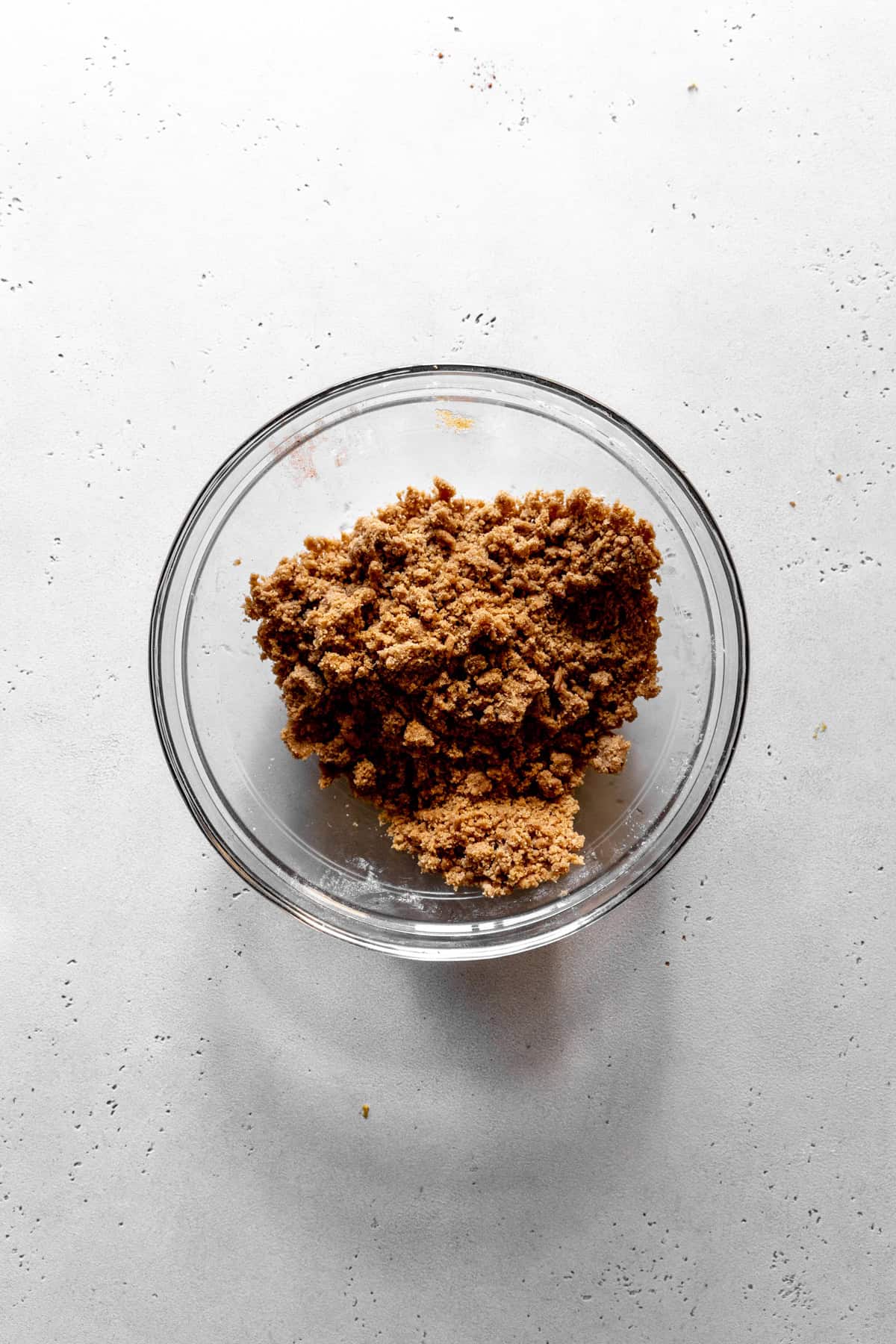 Glass bowl of streusel topping.
